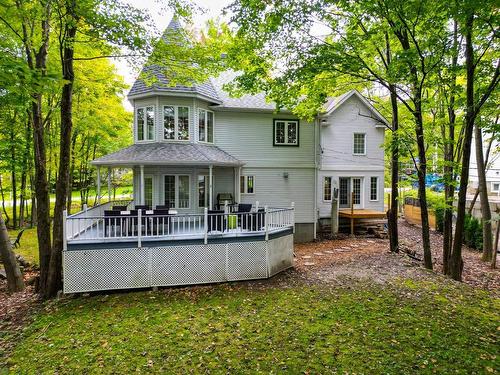 Back facade - 16425 Rue De L'Esplanade, Mirabel, QC - Outdoor With Above Ground Pool