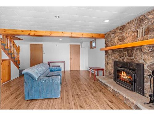 Family room - 20 Imp. Marion, Mont-Tremblant, QC - Indoor Photo Showing Living Room With Fireplace