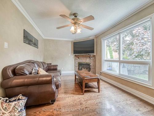 3206 Forrestdale Circ, Mississauga, ON - Indoor Photo Showing Living Room With Fireplace