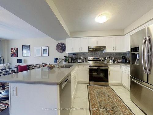 207 Eden Oak Tr, Kitchener, ON - Indoor Photo Showing Kitchen With Double Sink