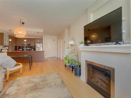 202-4394 West Saanich Rd, Saanich, BC - Indoor Photo Showing Living Room With Fireplace