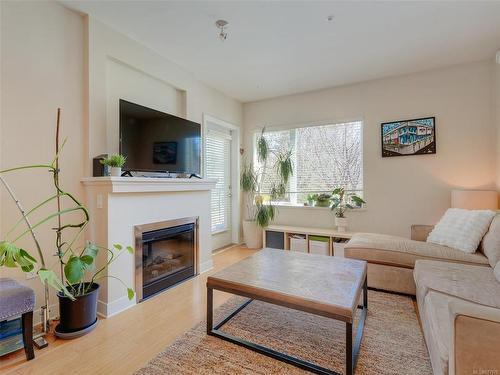 202-4394 West Saanich Rd, Saanich, BC - Indoor Photo Showing Living Room With Fireplace