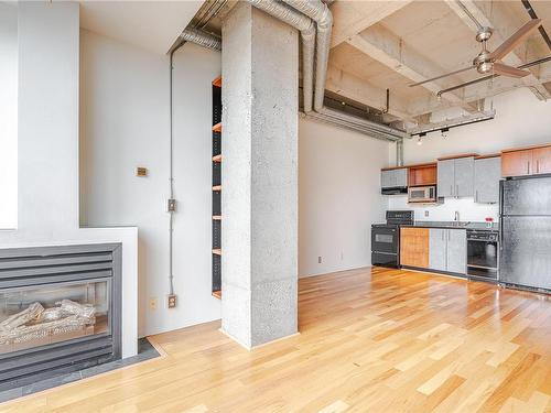 512-1061 Fort St, Victoria, BC - Indoor Photo Showing Kitchen With Fireplace