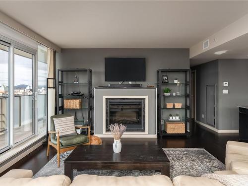 1406-707 Courtney St, Victoria, BC - Indoor Photo Showing Living Room With Fireplace