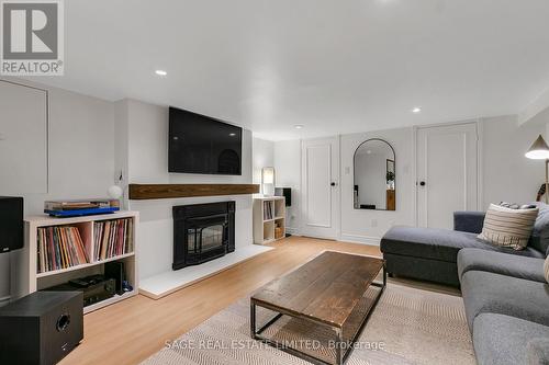 81 Wrenson Road, Toronto, ON - Indoor Photo Showing Living Room With Fireplace