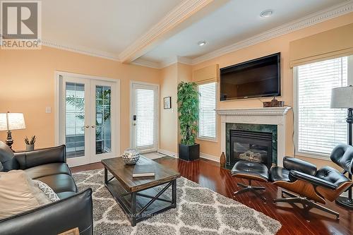 13 - 1061 North Shore Boulevard E, Burlington, ON - Indoor Photo Showing Living Room With Fireplace