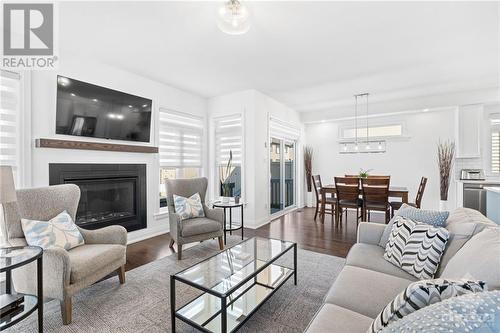 3375 Findlay Creek Drive, Ottawa, ON - Indoor Photo Showing Living Room With Fireplace