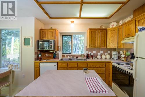 9052 North Nechako Road, Prince George, BC - Indoor Photo Showing Kitchen With Double Sink