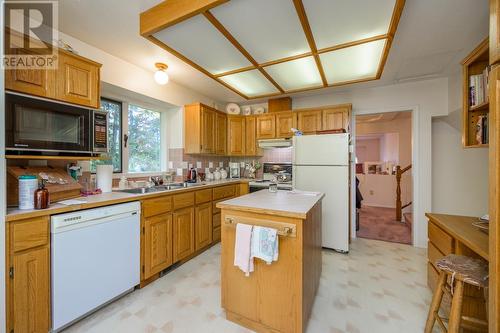 9052 North Nechako Road, Prince George, BC - Indoor Photo Showing Kitchen With Double Sink