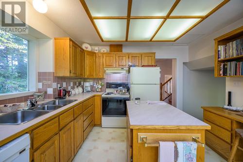 9052 North Nechako Road, Prince George, BC - Indoor Photo Showing Kitchen With Double Sink