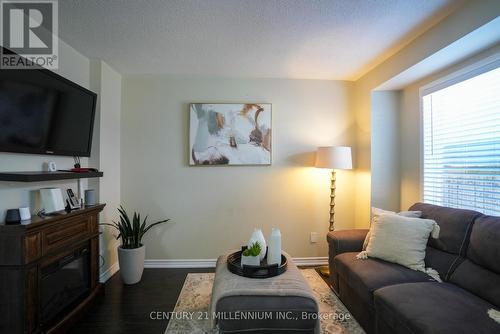 37 - 64 Brisbane Court, Brampton, ON - Indoor Photo Showing Living Room With Fireplace