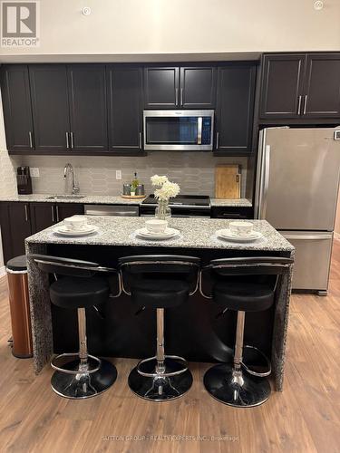 105 - 50 Ann Street, Caledon, ON - Indoor Photo Showing Kitchen With Stainless Steel Kitchen With Upgraded Kitchen