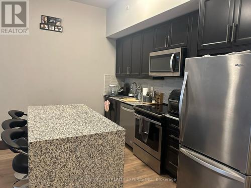 105 - 50 Ann Street, Caledon, ON - Indoor Photo Showing Kitchen With Stainless Steel Kitchen