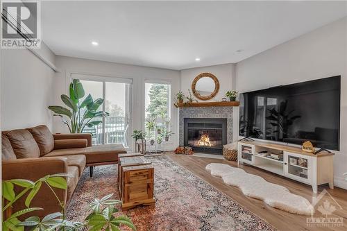 184 Briston Private, Ottawa, ON - Indoor Photo Showing Living Room With Fireplace