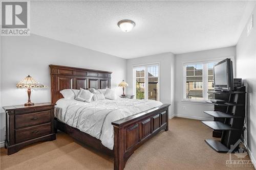 Primary bedroom - 715 Hazelnut Crescent, Ottawa, ON - Indoor Photo Showing Bedroom