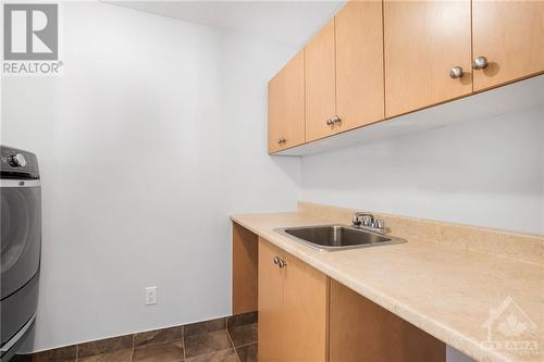 2nd floor laundry room - 715 Hazelnut Crescent, Ottawa, ON - Indoor Photo Showing Kitchen