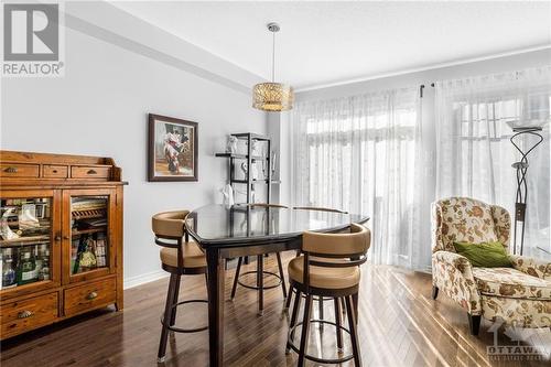 Dining area with patio doors to rear yard - 715 Hazelnut Crescent, Ottawa, ON - Indoor Photo Showing Dining Room