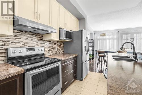 Stainless steel appliances - 715 Hazelnut Crescent, Ottawa, ON - Indoor Photo Showing Kitchen With Double Sink With Upgraded Kitchen