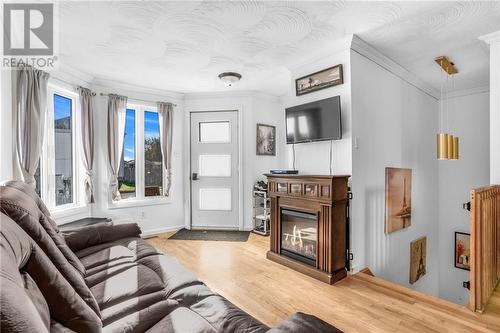 875 Pilon Street, Hawkesbury, ON - Indoor Photo Showing Living Room With Fireplace