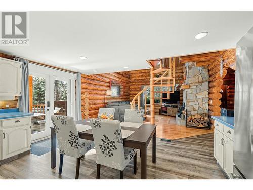 1725 Keloka Drive, West Kelowna, BC - Indoor Photo Showing Dining Room With Fireplace