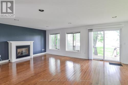 13 Old Indian Trail N, Ramara, ON - Indoor Photo Showing Other Room With Fireplace