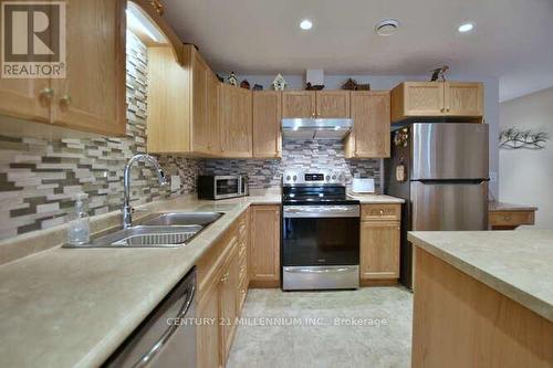 138 Meadow Lane, Wasaga Beach, ON - Indoor Photo Showing Kitchen With Stainless Steel Kitchen With Double Sink