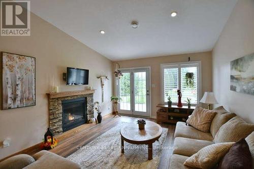 138 Meadow Lane, Wasaga Beach, ON - Indoor Photo Showing Living Room With Fireplace