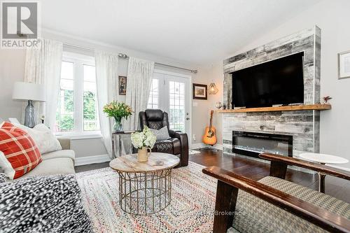 130 New York Avenue, Wasaga Beach, ON - Indoor Photo Showing Living Room With Fireplace