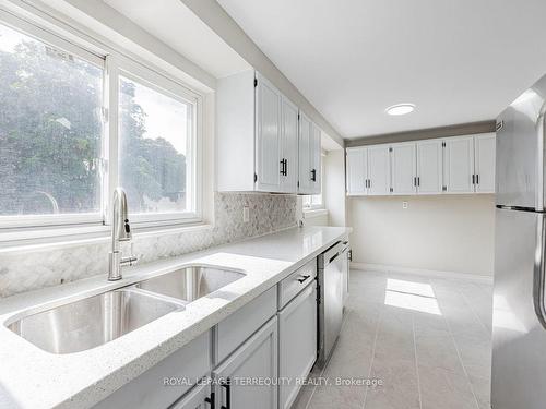 23-21 Rockwood Dr, Toronto, ON - Indoor Photo Showing Kitchen With Double Sink