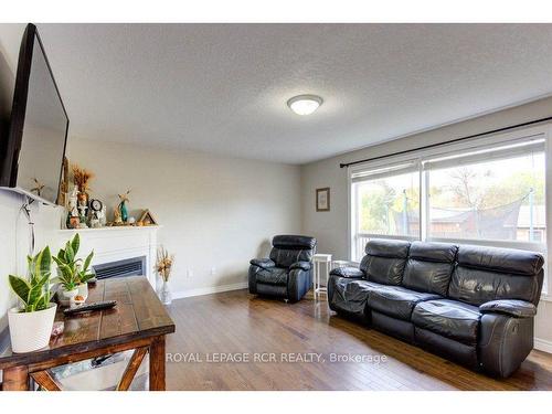 132 Schmidt Dr, Wellington North, ON - Indoor Photo Showing Living Room With Fireplace