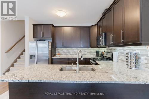 MAIN LEVEL: Quartz Kitchen w/ Stainless Appliances - 48 - 2235 Blackwater Road, London, ON - Indoor Photo Showing Kitchen With Double Sink With Upgraded Kitchen