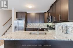 MAIN LEVEL: Quartz Kitchen w/ Stainless Appliances - 