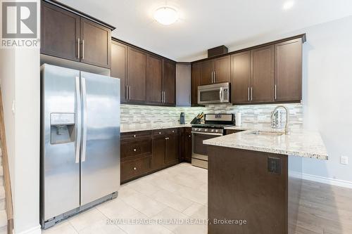 MAIN LEVEL: Quartz Kitchen w/ Stainless Appliances - 48 - 2235 Blackwater Road, London, ON - Indoor Photo Showing Kitchen With Upgraded Kitchen