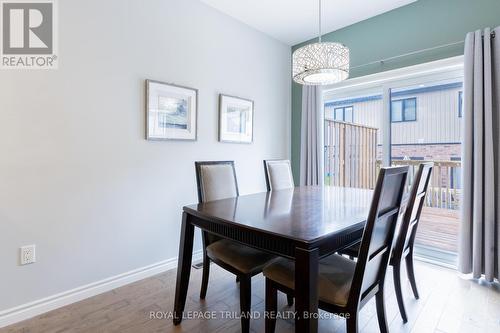 MAIN LEVEL: Dining Area Leading to Sun Deck - 48 - 2235 Blackwater Road, London, ON - Indoor Photo Showing Dining Room