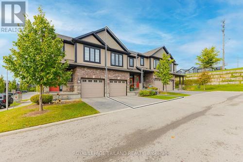 Townhome boasts attached garage w/ inside entry! - 48 - 2235 Blackwater Road, London, ON - Outdoor With Facade