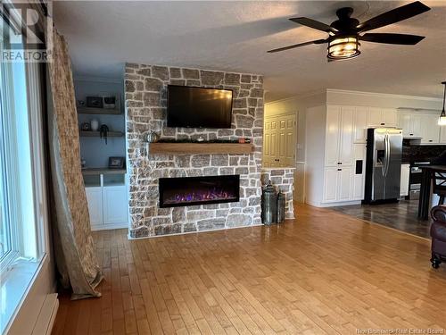 5 Richard Road, Drummond, NB - Indoor Photo Showing Living Room With Fireplace