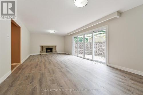 70 Pettit Drive, Toronto, ON - Indoor Photo Showing Other Room With Fireplace