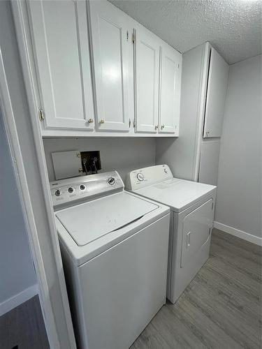 E 6 1545 Main Street E, Swan River, MB - Indoor Photo Showing Laundry Room