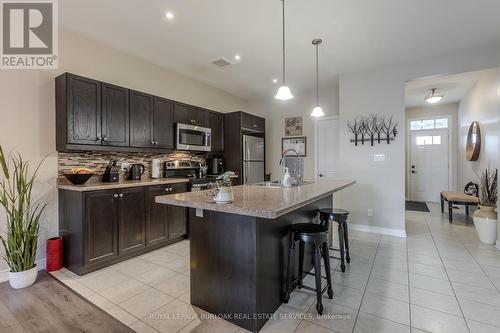 24 Manorwood Drive, West Lincoln, ON - Indoor Photo Showing Kitchen With Upgraded Kitchen