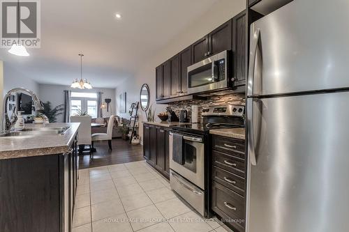 24 Manorwood Drive, West Lincoln, ON - Indoor Photo Showing Kitchen With Stainless Steel Kitchen With Double Sink