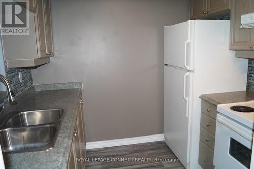 327 - 68 Corporate Drive, Toronto, ON - Indoor Photo Showing Kitchen With Double Sink