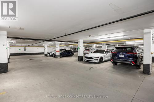 9 - 55 Cedarcroft Boulevard, Toronto, ON - Indoor Photo Showing Garage