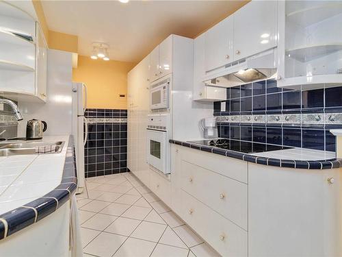 104-2050 White Birch Rd, Sidney, BC - Indoor Photo Showing Kitchen With Double Sink