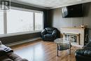 25 Bishop Street, Gander, NL  - Indoor Photo Showing Living Room With Fireplace 