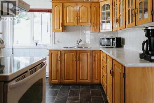 25 Bishop Street, Gander, NL - Indoor Photo Showing Kitchen With Double Sink