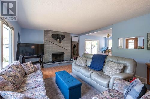 8119 Purves Road, Summerland, BC - Indoor Photo Showing Living Room With Fireplace