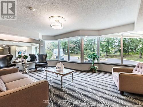 1402 - 8 Lisa Street E, Brampton, ON - Indoor Photo Showing Living Room