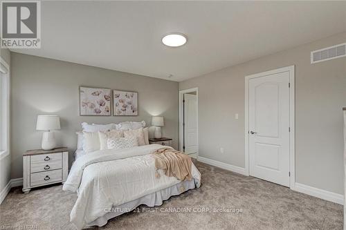 124 Basil Crescent, Middlesex Centre (Ilderton), ON - Indoor Photo Showing Bedroom