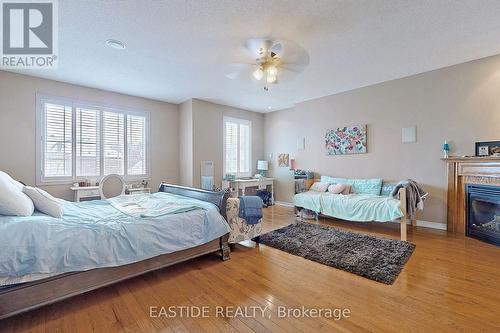 160 Championship Circle Place, Aurora, ON - Indoor Photo Showing Bedroom With Fireplace