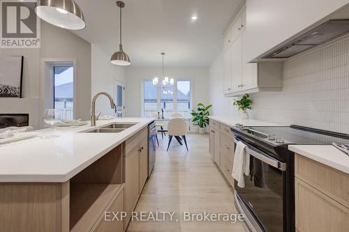 19 Carriage Crossing, Mapleton, ON - Indoor Photo Showing Kitchen With Double Sink With Upgraded Kitchen